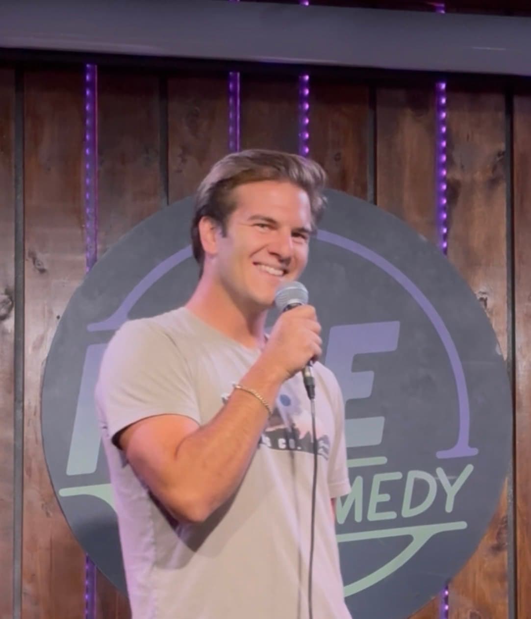 Blake Rockwell on stage at Rise Comedy